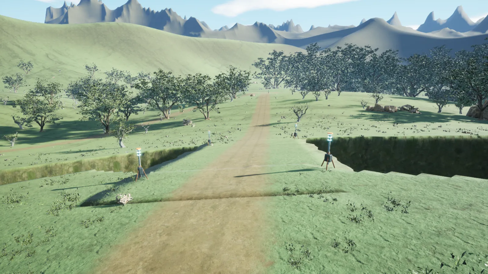 A dirt track runs inland through green hills and a line of trees